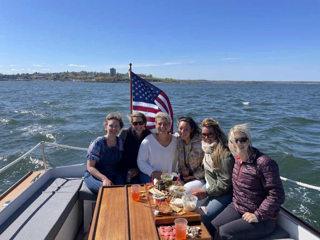 group of friends on calista ann | private boat charter maine